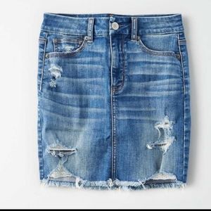 American Eagle Medium wash distressed mini skirt